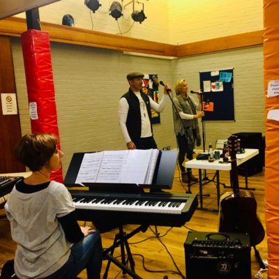 Image of band members practising in the Youth Centre Hall
